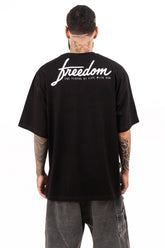 Camiseta over FREEDOM HAS PRICE