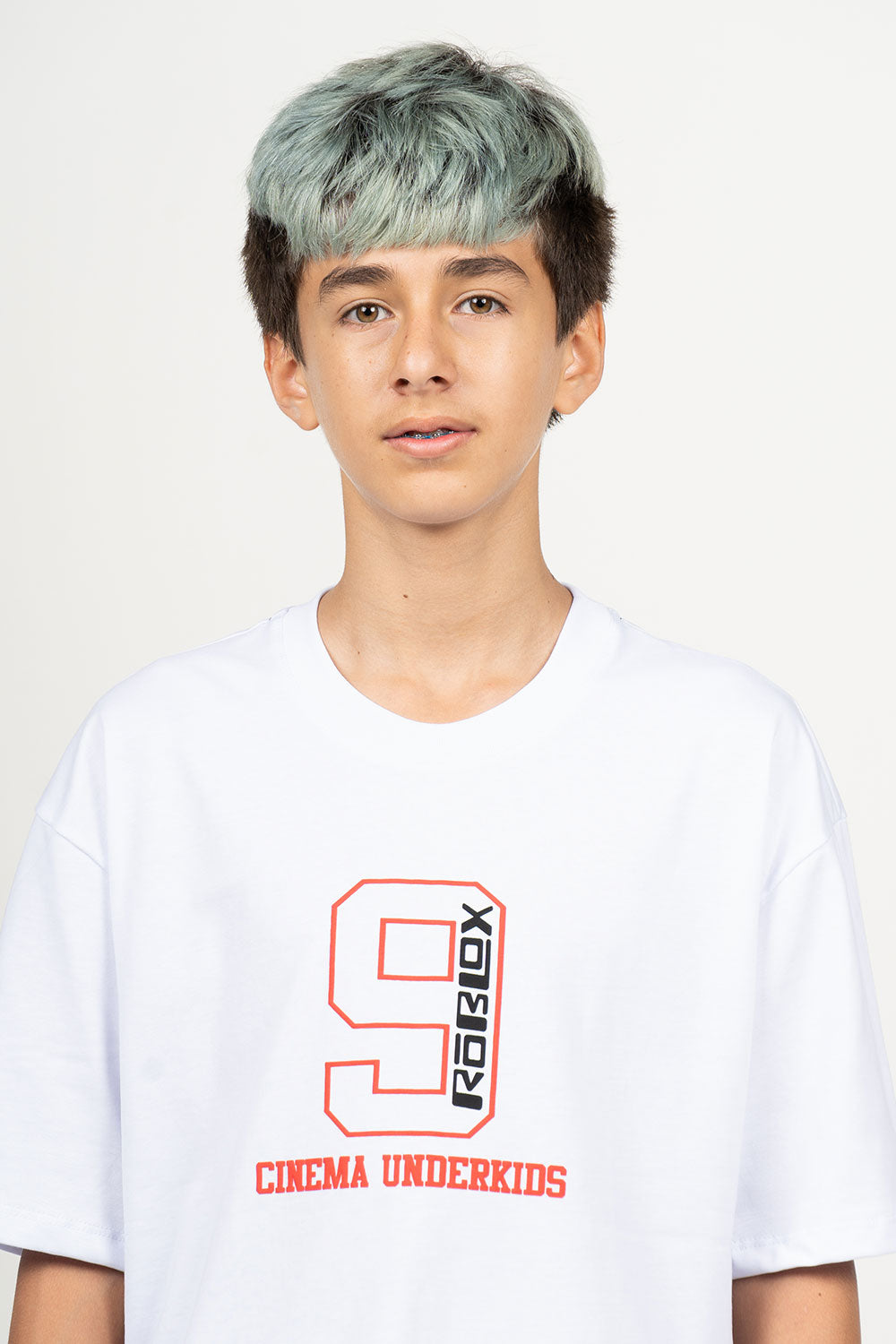 camiseta over LA ESOK SEKOLAH