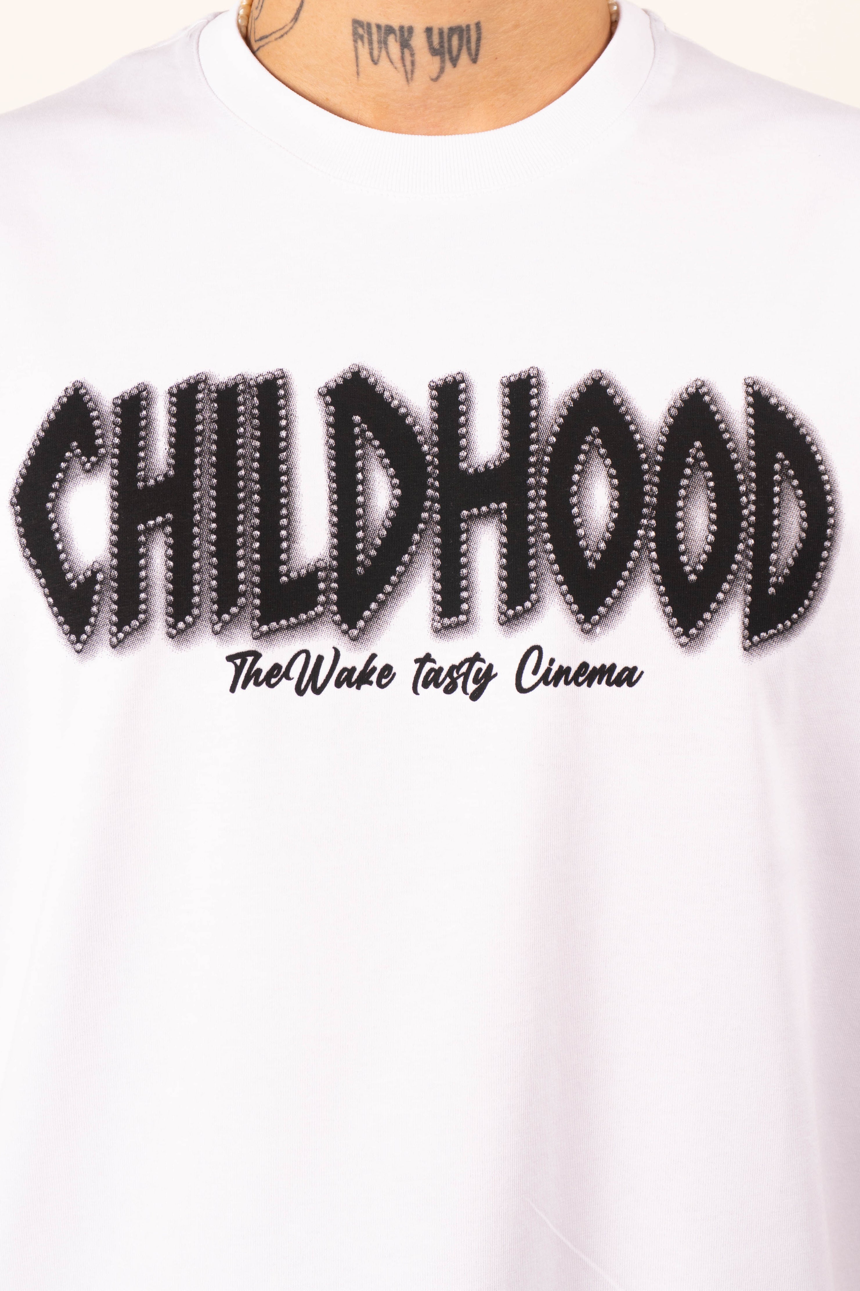 Camiseta over CHOLDHOOD