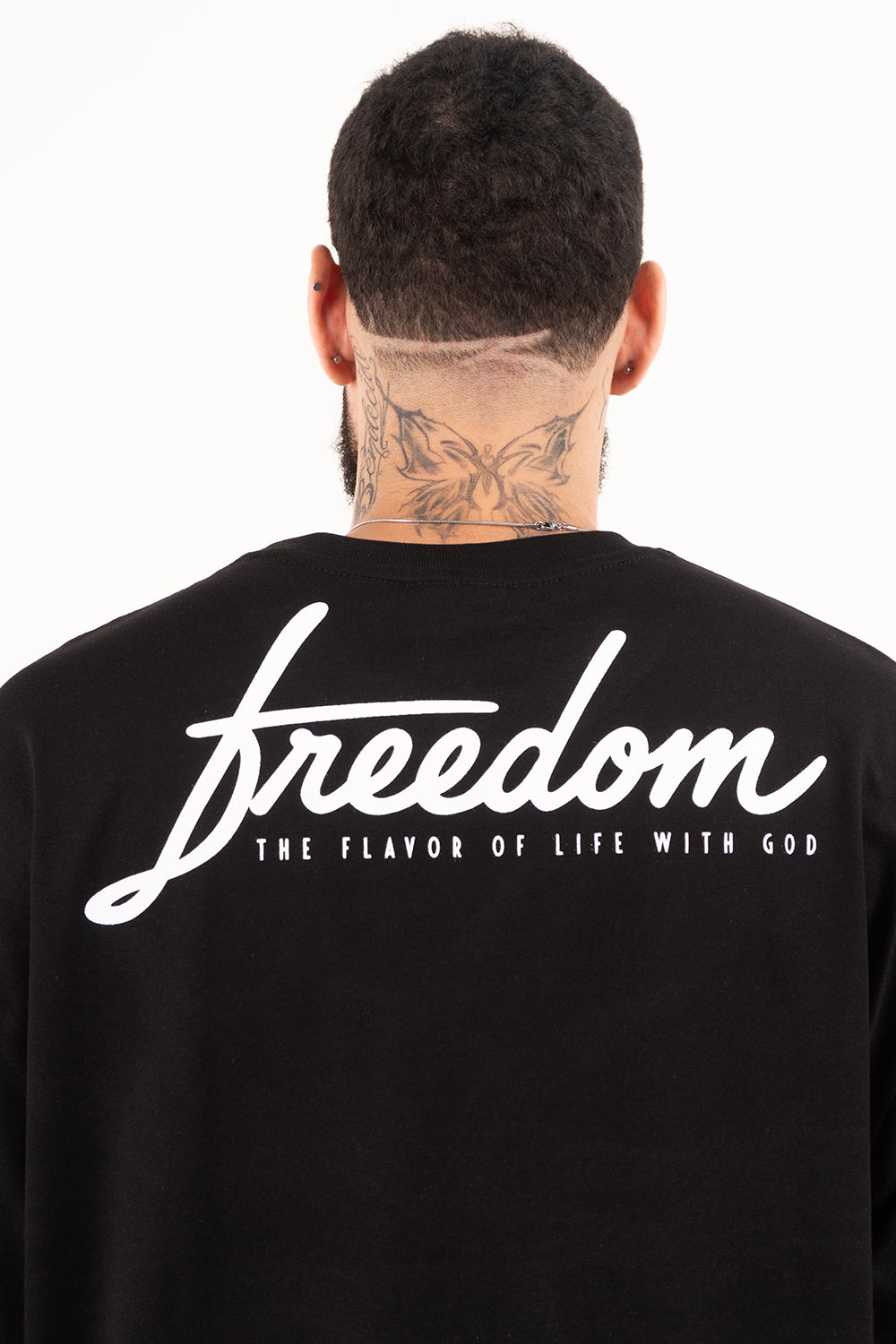 Camiseta over FREEDOM HAS PRICE
