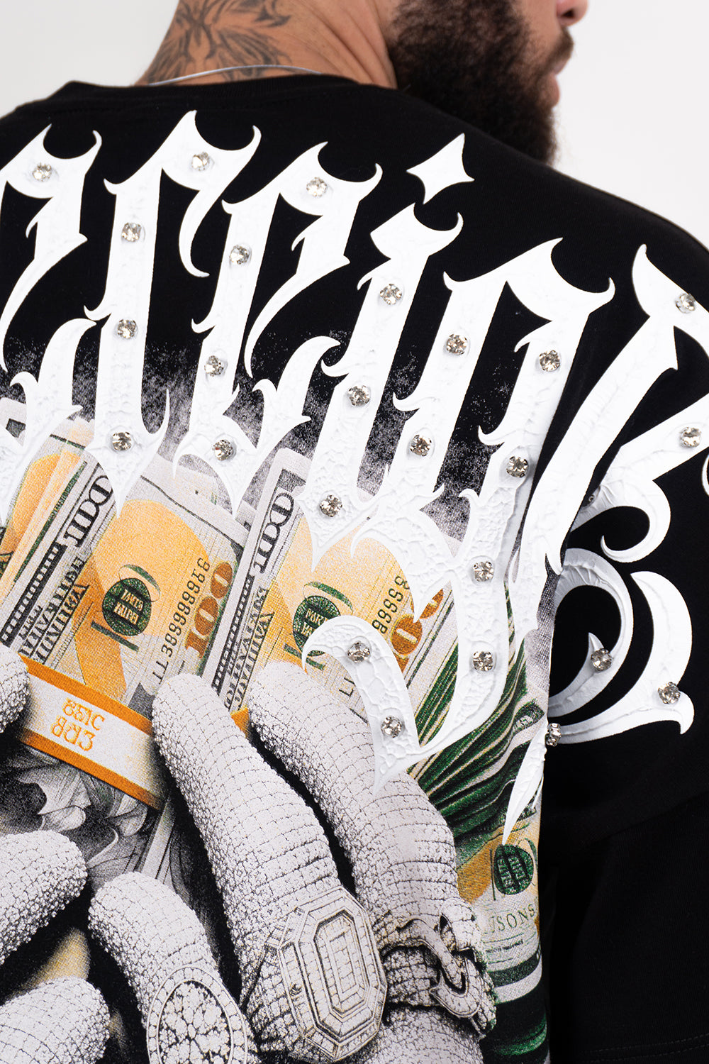 Camiseta over con taches MONEY RULES
