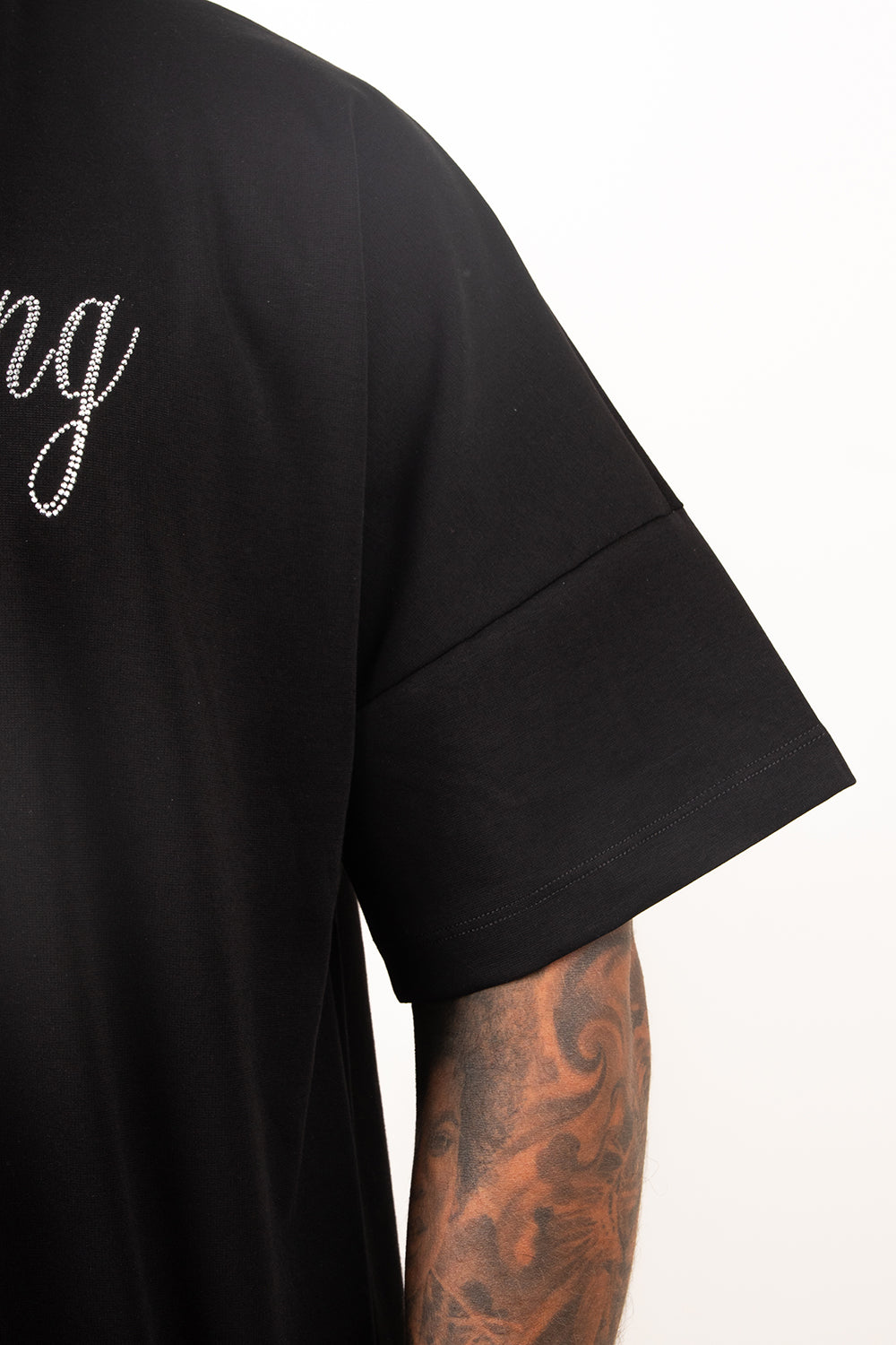 Camiseta over NEVER GIVE UP plata
